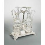 An early 19th century French metalwares silver oil and vinegar table stand,