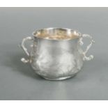 A Charles II silver porringer,