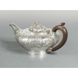 A William IV silver teapot,