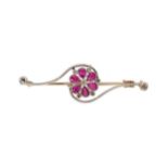 An early 20th century synthetic ruby and diamond flower brooch,