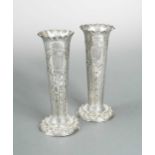 A pair of Victorian silver spill vases,