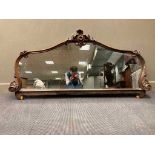 A dresser mirror with carved foliate decoration, 90 x 187cm