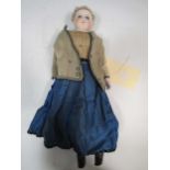 A Victorian porcelain head doll, with blond wig, blue glass eyes, leather body, in period style