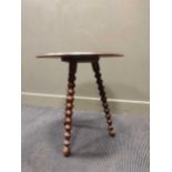 A mahogany side table with bobbin turned legs 59cm high