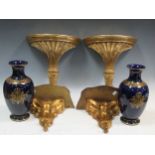 A pair of French blue vases and gilt wall brackets; together with another pair of gilt wall