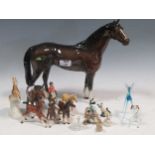 A large size Beswick horse 31cm high, a small size foal, toegther with various other equine models