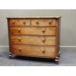 A 19th century mahogany chest of two short over three long drawers with cast metal lion handles