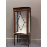 A mahogany glazed display cabinet 135 x 59.5 x 31.5cm