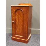 A late 19th/ 20th century satinwood bedside cabinet with single door on a plinth base, 80 x 40 x