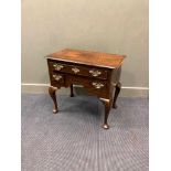 An 18th century low boy with three drawers on cabriole legs and pad feet 68 x 74 x 43cmCondition