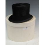 A 'Henry Heath Limited' tophat inscribed on inner lining 'K C D', black silk with a black band and