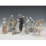 A large collection of Lladro and other figures