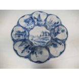 A 19th century Delft plate decorated with shipping scenes30cm diameterCondition report: chips to