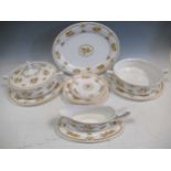 A Spode bone china dinner service with Austen pattern, comprising of two terrine dishes and one lid,