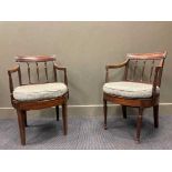 A pair of late George III arm chairs (1 with front legs replaced)