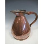 A large 19th century two gallon copper measuring jug, 31cm high