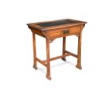 An Arts & Crafts oak writing table,