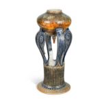 Robert Wallace Martin for Martin Brothers, a stoneware oil lamp base, circa 1874,