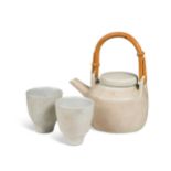 § David Leach OBE (British, 1911-2005), a Lowerdown pottery teapot and two tea bowls,