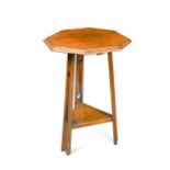 An Art Nouveau oak occasional table,