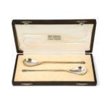 A cased pair of silver preserve spoons by Omar Ramsden,