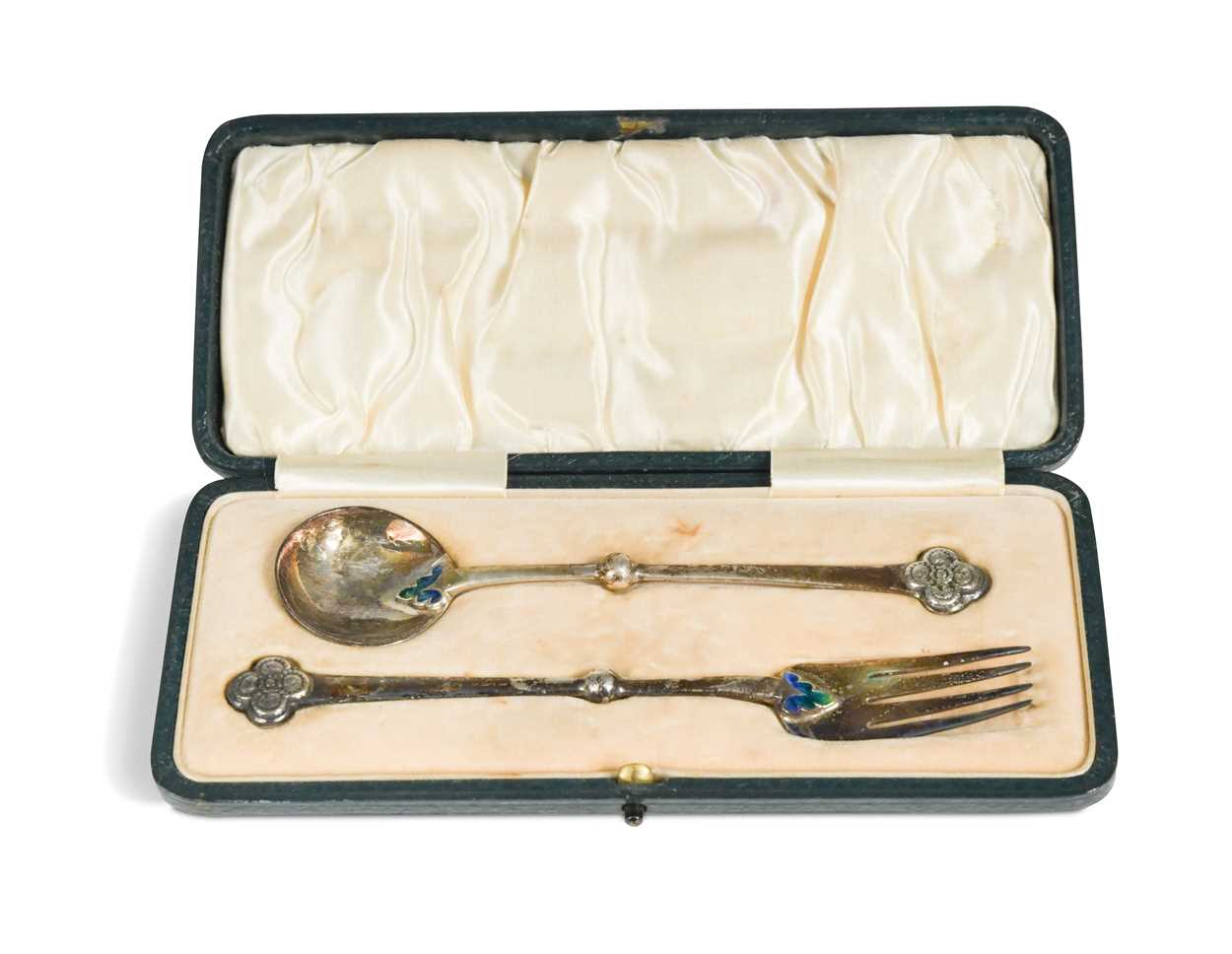 A cased silver and enamel Christening set by William Hair Haseler, possibly for Liberty & Co.,