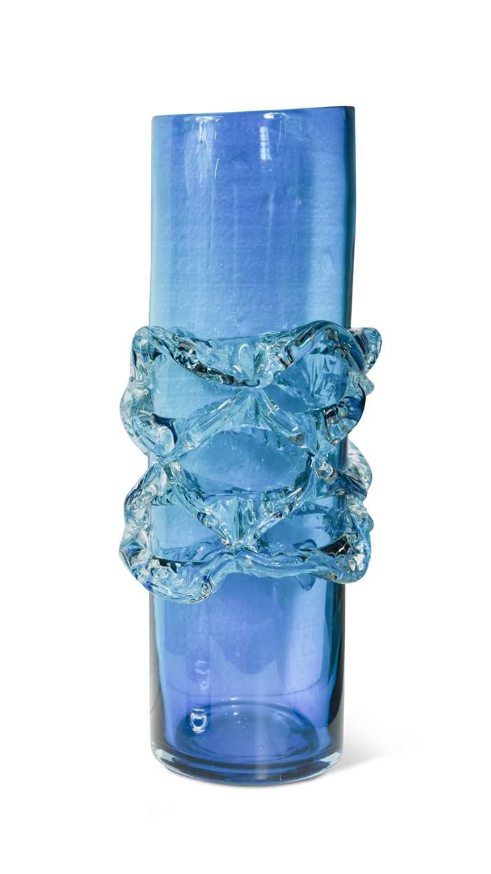 A tall turquoise glass chimney vase,