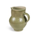 § Bernard Leach CH, CBE (British, 1887-1979), a stoneware bellied jug,