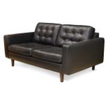 Paola Navone for Contempo, a black leather Urano two-seat sofa,