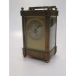 A 19th century brass carriage clock, with Arabic chapter ring, 12.5cm high