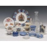 A collection of commemorative ceramics and glassware