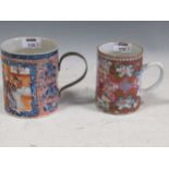 Two 18th century Chinese export tankards, tallest 13cm (2) The smaller tankard has fading to the