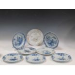 Eight Chinese export plates decorated with flowers and temple scenes, 23cm diameter