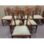 A matched set of seven George III and later shield back mahogany dining chairs, to include four 18th