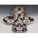 Four Derby and Davenport plates decorated with floral motif and gilt
