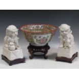A Chinese modern famille rose bowl on a hardwood stand, 30cm diameter; a pair of Chinese blanc de