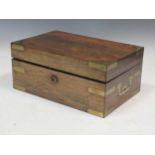 A Victorian rosewood travelling toilet and jewellery box with brass bound corners, 30 cms, with name