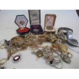 A collection of costume jewellery and coins