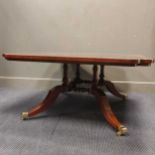 A large modern mahogany coffee table 51 x 107 x 120cm