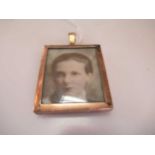 A portrait pendant, tested as 9ct gold, gross weight 41.9g