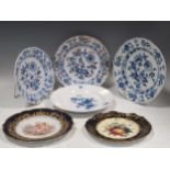 Four Meissen blue and white plates and a Sevres plate painted with cherubs (6)