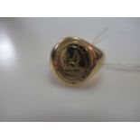 A signet ring stamped '18', weight 12.3gThe ring is slightly warped on the band and slight