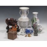 A collection of mostly Chinese decorative ceramicsThe white vase decorated with a lady has a large