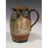 A Doulton Lambeth golf jug, 24cm highThe jug has chipping to the spout with some loss. Fracture