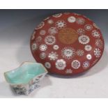 A Chinese lacquered and mother of pearl inlay circular box and cover, 39cm diameter; a small Chinese