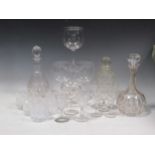 A collection of crested and armorial glasses, cut glass decanters, whisky tumblers etc.