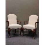 A pair of mahogany open arm chairs, in George I style (2)