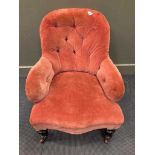 A Victorian spoon back chair upholstered in a coral material