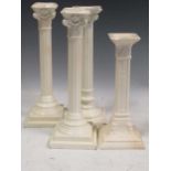 A pair of creamware columnar candlesticks and two others, tallest 31.5cm(4)