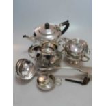 A pair of silver sauce ladles, 2 silver cosmetics jars (one with glass body), an 800 standard